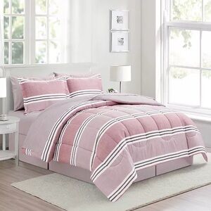 Reversible Color block w a seaside vibe, the Aiden comforter Set.